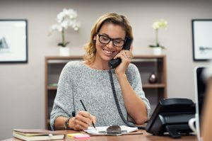happy woman in telephone
